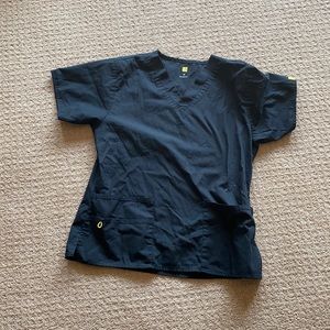 Scrubs top with pockets.